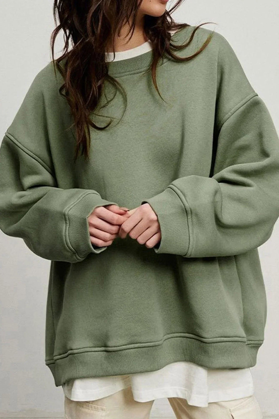 Versatile women's oversized round neck pullover, a cozy top for everyday style and casual wear.
