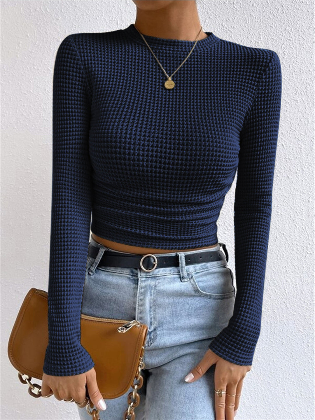 Women's long sleeve waffle knit top, a cozy and stylish choice for everyday comfort.