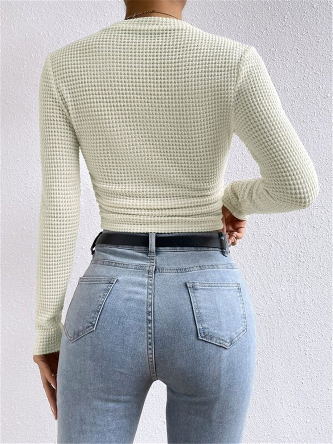 Casual cropped waffle knit long sleeve top for women, ideal for autumn & winter fashion.