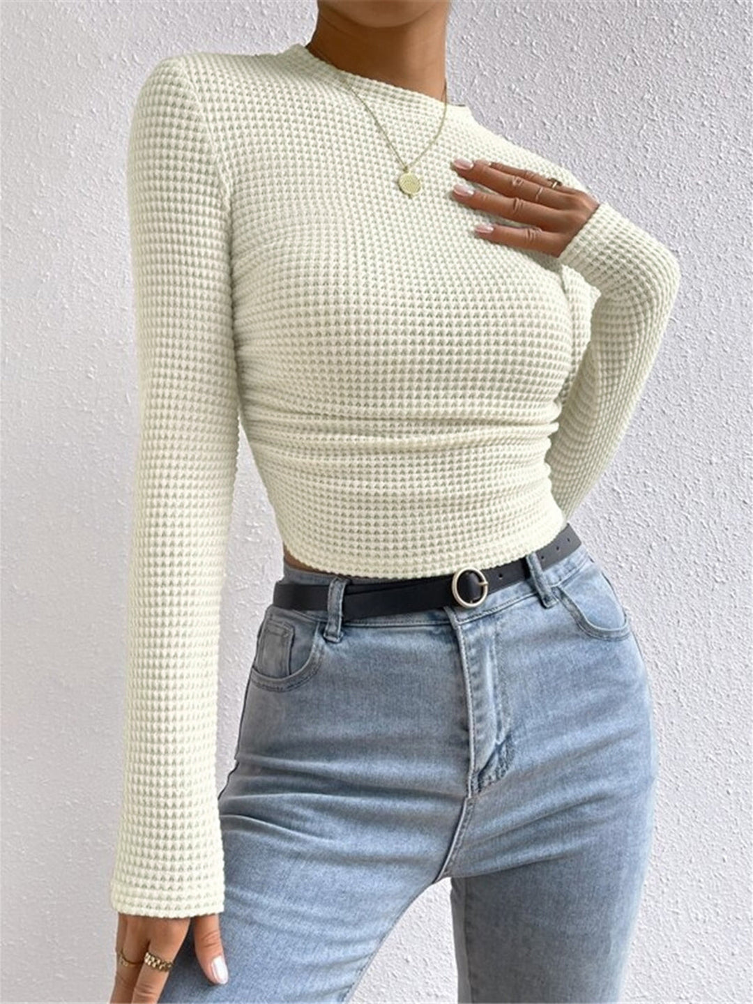 Versatile women's long sleeve top with a cozy waffle knit texture, great for layering.