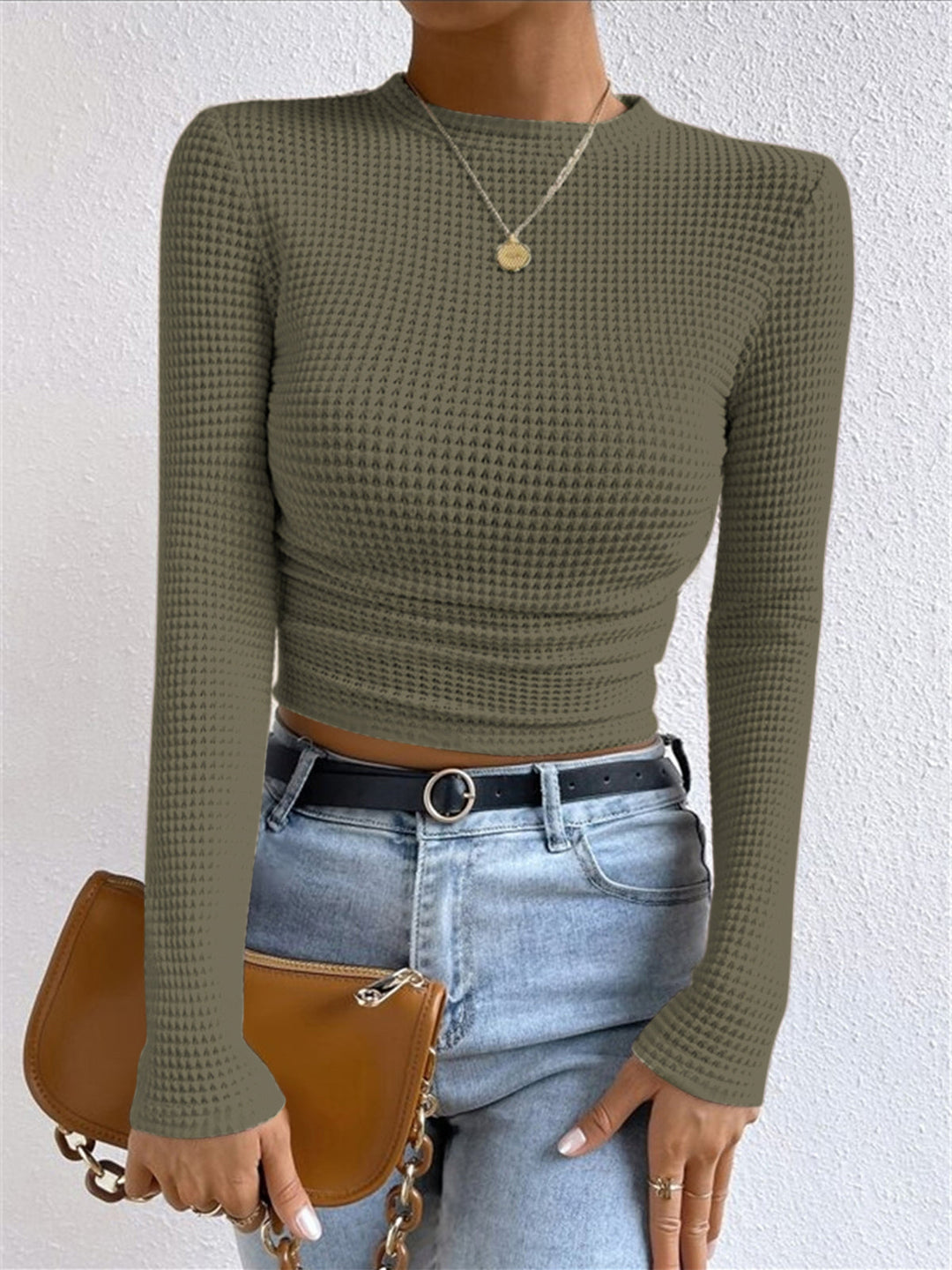 Cozy women's waffle knit long sleeve top, a comfortable and casual piece for versatile fashion.