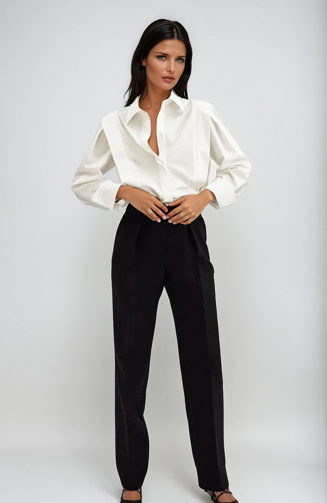 Women's crisp long sleeve button-down shirt in white, perfect workwear blouse.