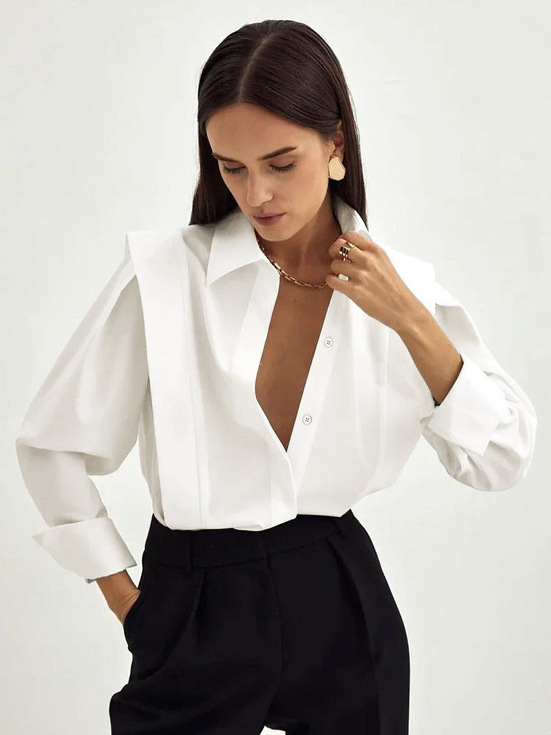Elegant women's blouse, a versatile button-down top for any occasion.