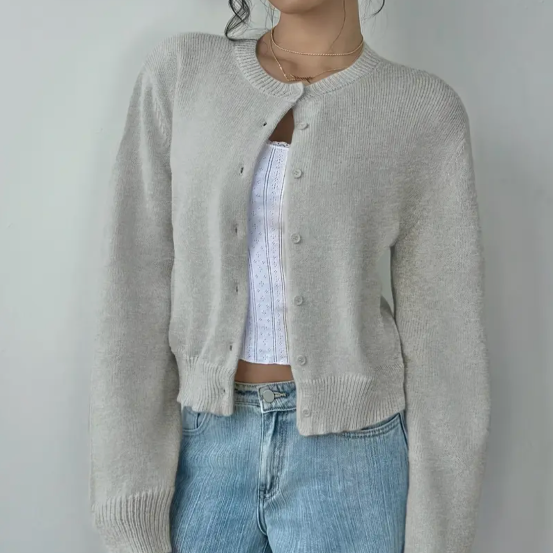Everyday women's cropped cardigan, comfortable button-up style with stylish ribbed details.