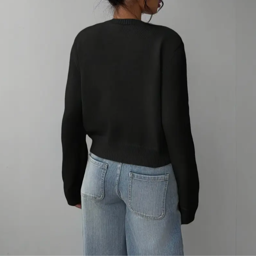 Casual women's cropped button-up cardigan, featuring a stylish ribbed trim & versatile design.