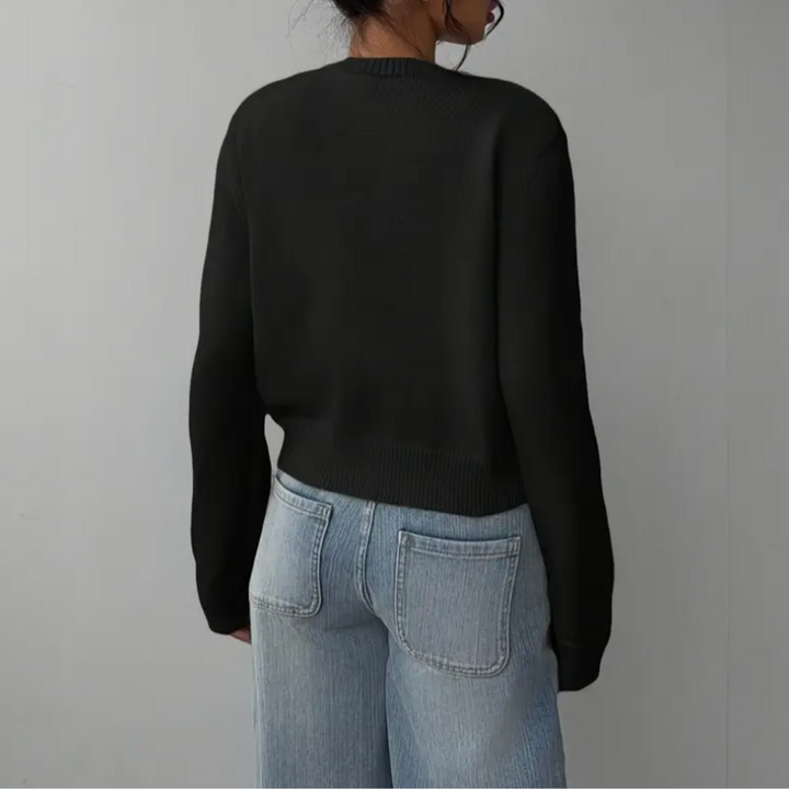 Casual women's cropped button-up cardigan, featuring a stylish ribbed trim & versatile design.