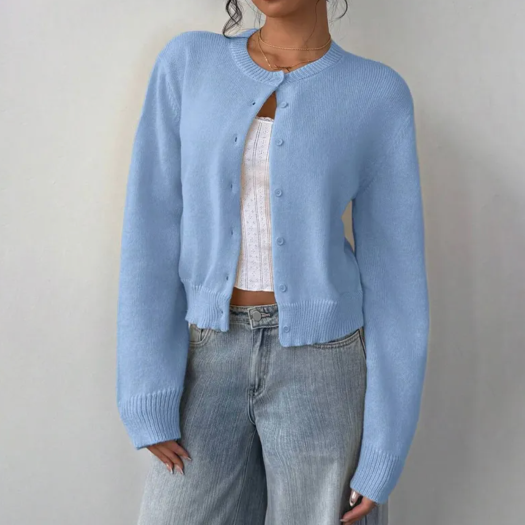 Stylish cropped length cardigan for women, a modern button-up layer with ribbed detailing.