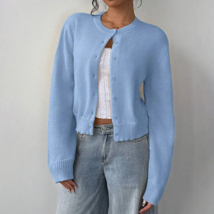 Stylish cropped length cardigan for women, a modern button-up layer with ribbed detailing.