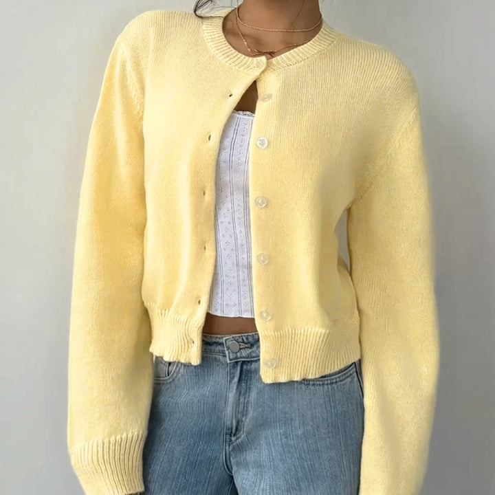 Professional women's cropped cardigan, perfect for office wear with ribbed trim & button closure.