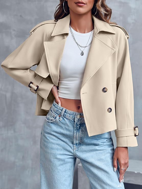 Women's cropped double-breasted trench coat in beige, offering a stylish and classic look.