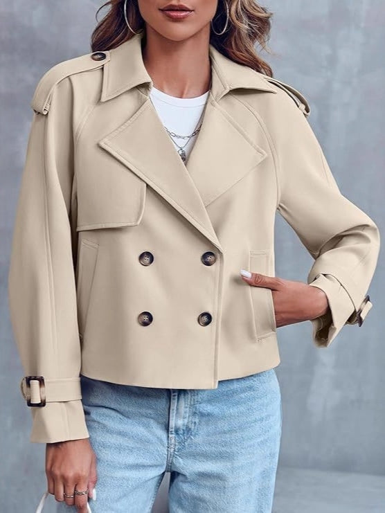 Fashionable short trench coat for women, featuring a chic double-breasted design.