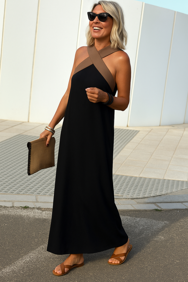Summer fashion: women's elegant maxi dress with a unique crossed front.