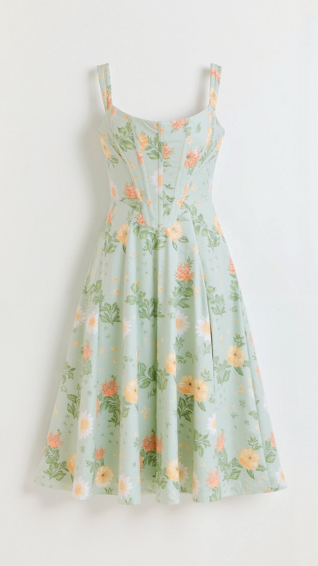 Woman wearing a flowing Dahlia floral midi dress, a chic and comfortable choice for brunch.