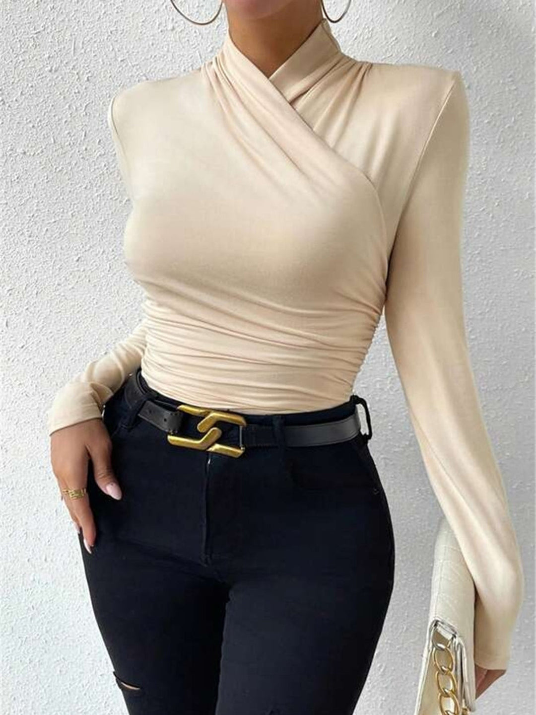 Versatile women's crossover blouse, ideal for day to night transitions.