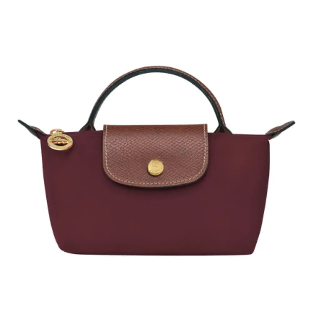 Interior view of the Elan compact shoulder bag, organized for essentials.