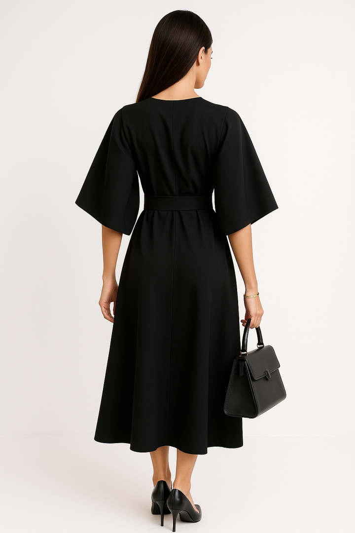 Versatile midi dress with crew neck, suitable for office or evening wear.