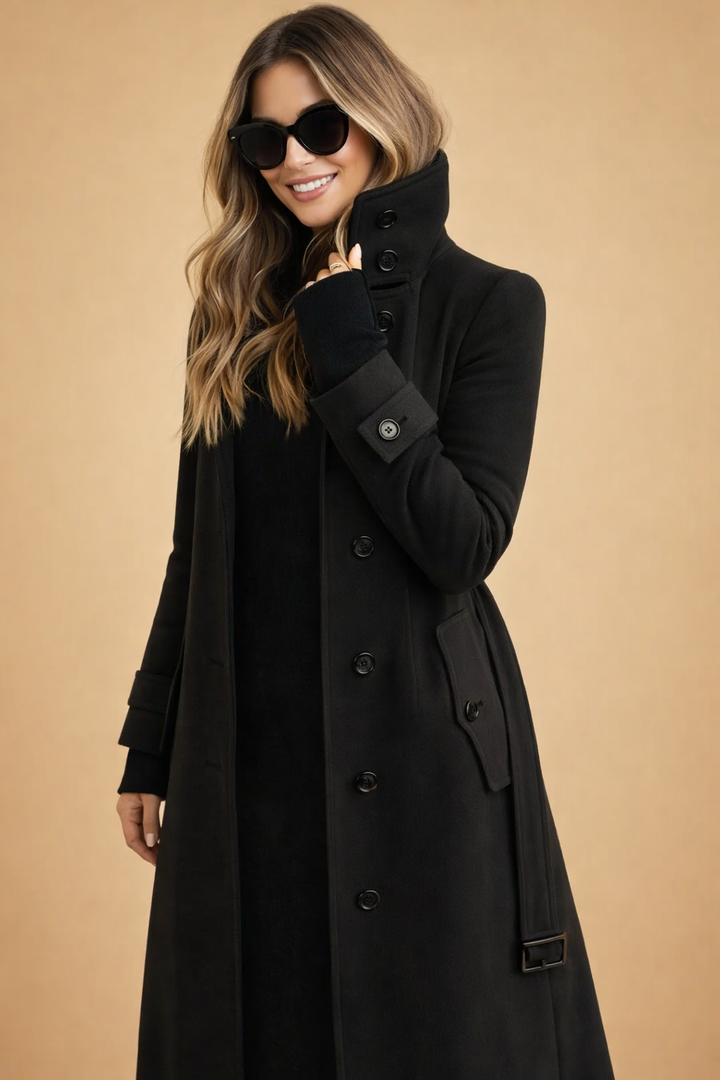 Urban style long winter coat for women, showcasing a classic double-breasted cut and high collar.