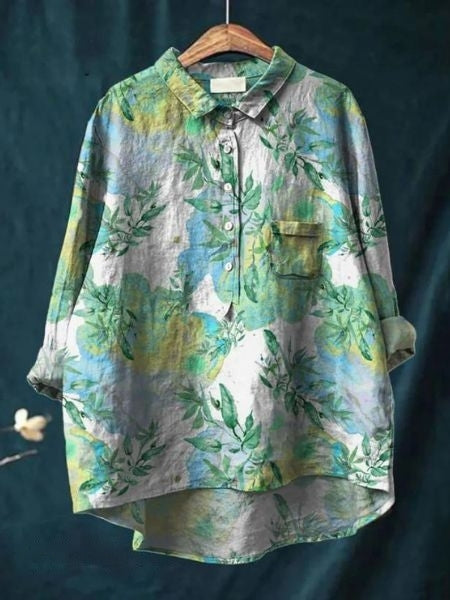 Casual yet elegant women's print shirt with floral detailing.