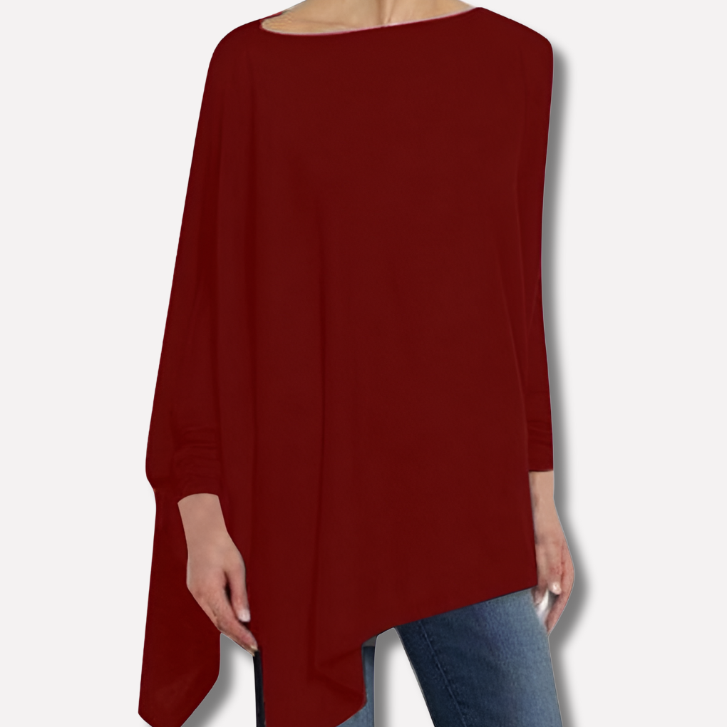 Plus size women's chic long sleeve top, offering both comfort and sophisticated style.