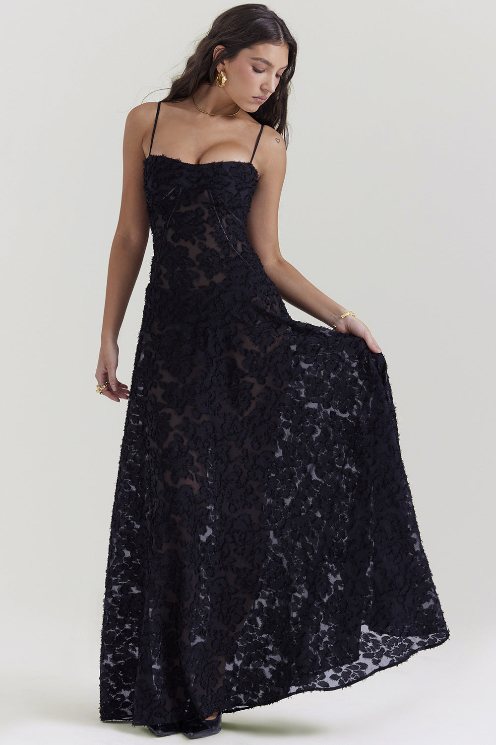Flowy long spaghetti strap maxi dress for women, offering a chic slim fit, ideal for summer or evening wear.
