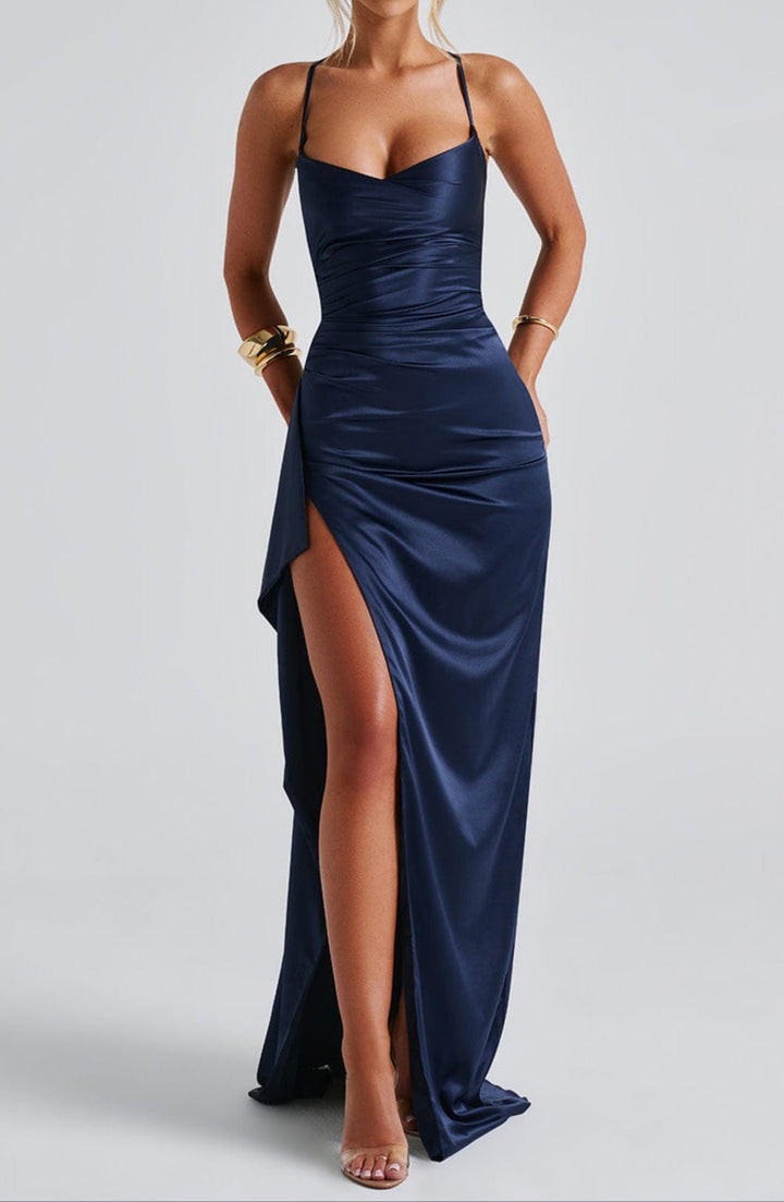 Elegant navy blue formal dress for women, perfect for a black-tie event.