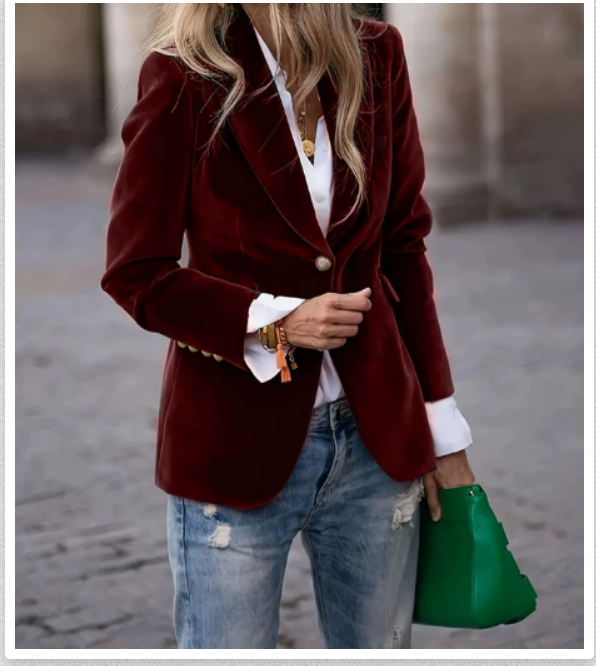 Chic fashion statement: a women's elegant velvet blazer offering luxury and style.