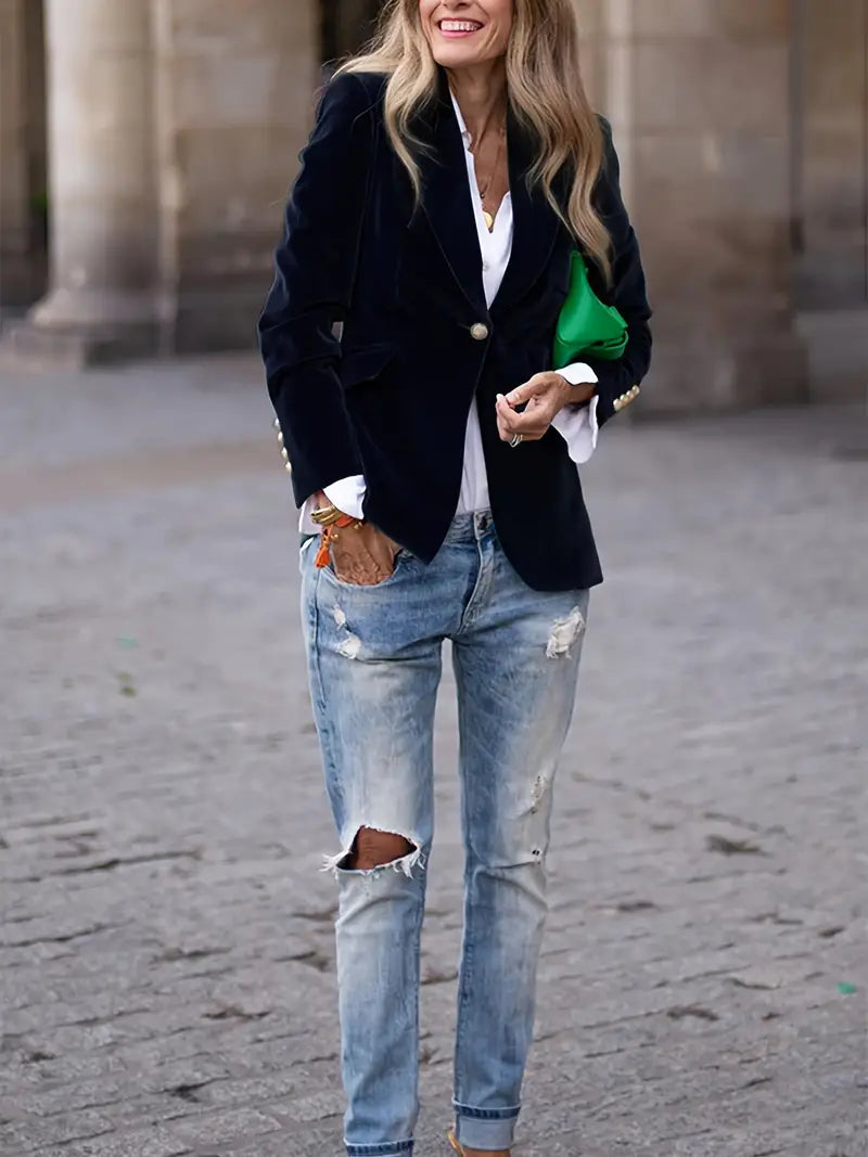 Sophisticated black velvet blazer for women, ideal for parties and elegant styling.