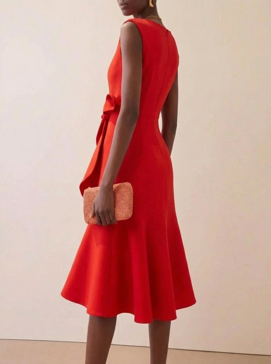 Sleeveless red midi party dress with charming ruffles, ideal for evening events and cocktails.