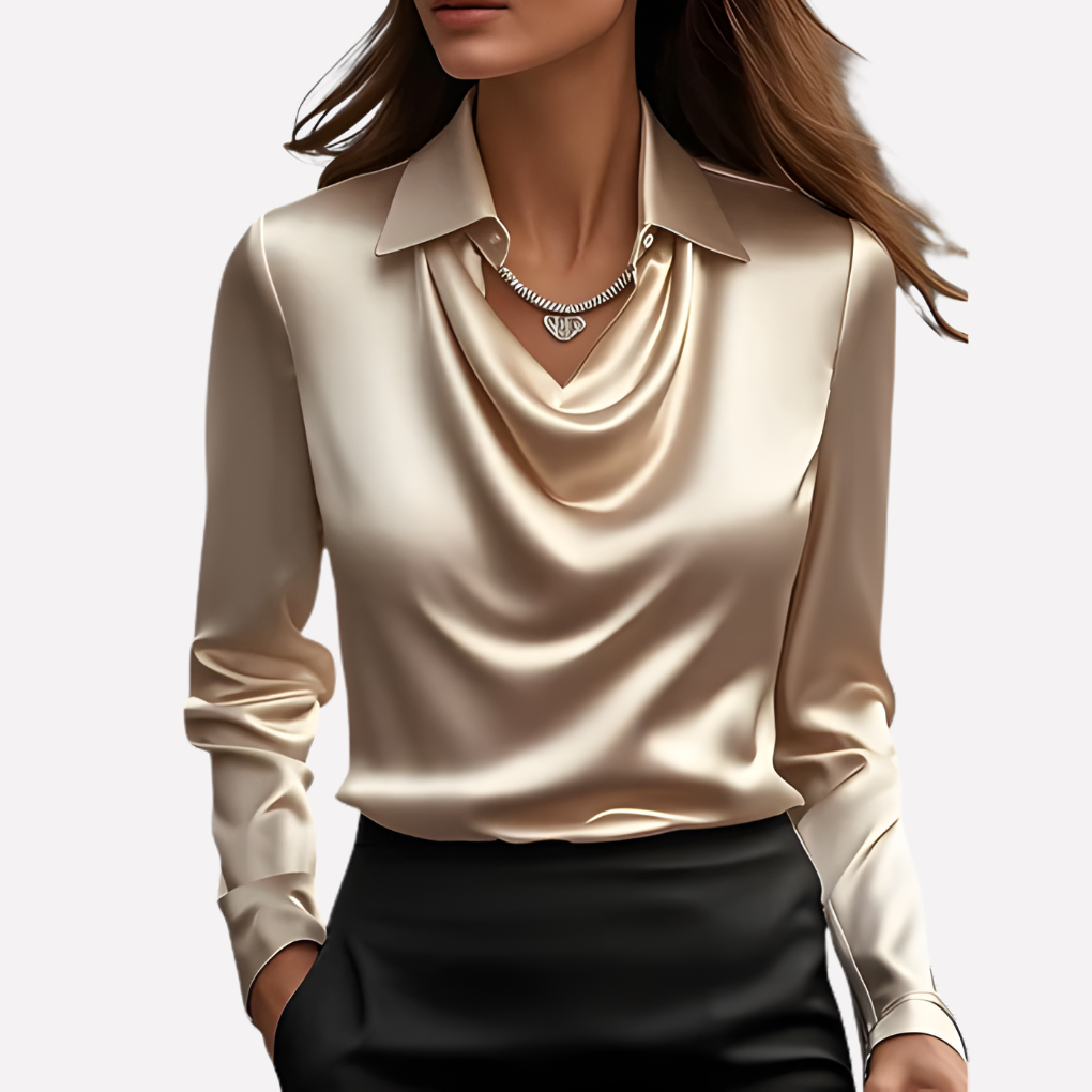 Elegant satin blouse designed with a flattering draped collar detail.