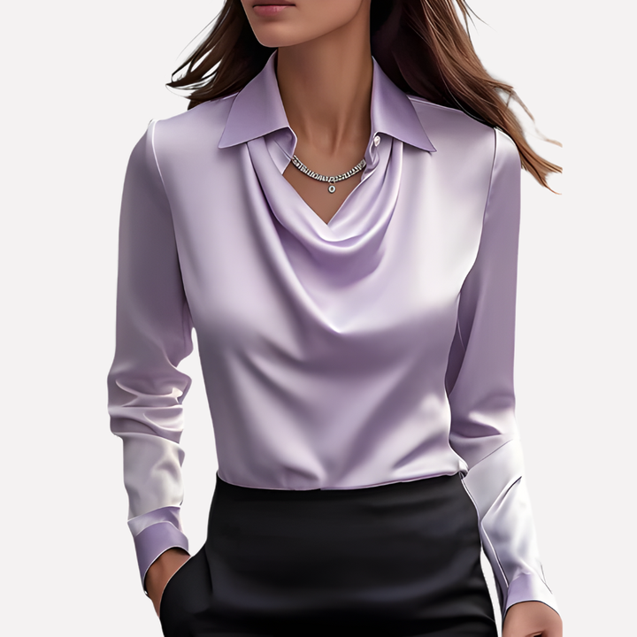 Showcasing the elegant draped collar on this women's long sleeve satin blouse.