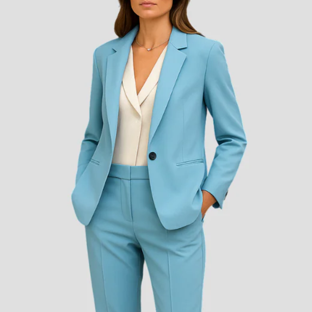 Tailored women's blazer and matching trousers set, offering a sharp, elegant look for professional settings.