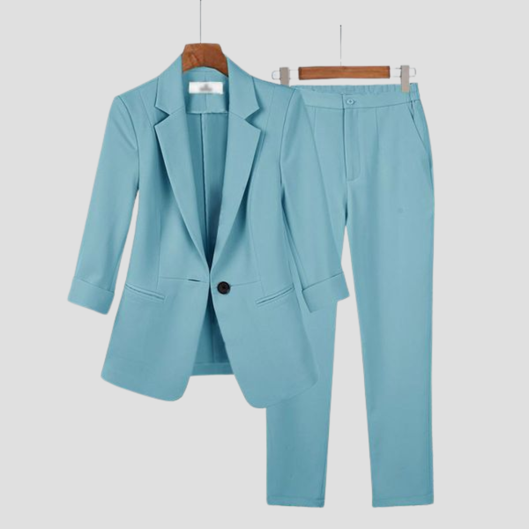 Chic women's professional wear: tailored two-piece blazer and trousers set, ideal for modern office fashion.