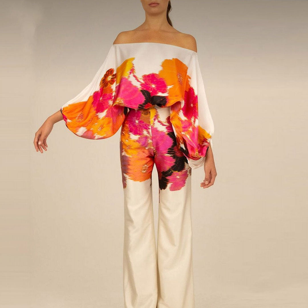 Fashionable ensemble: Women's chic summer set with eye-catching playful print and comfortable wide leg trousers.