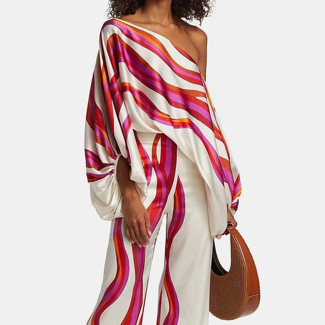Elegant two-piece outfit for women: Stylish summer set with unique playful prints and flowing wide leg pants.