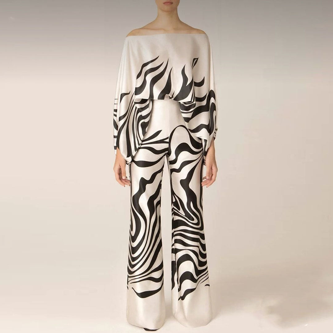 Ladies summer fashion: Casual chic two-piece set for women, showcasing playful prints and lantern sleeve blouse.