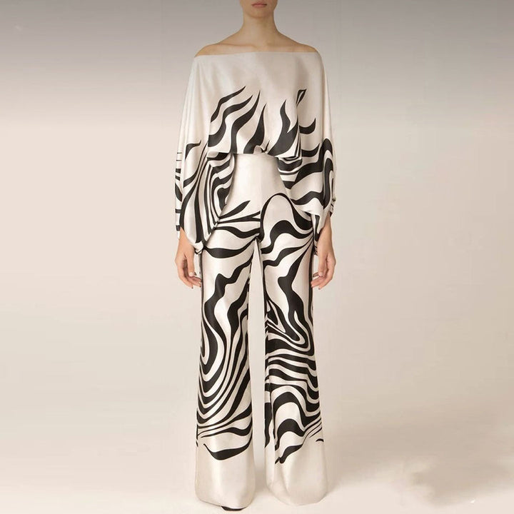 Ladies summer fashion: Casual chic two-piece set for women, showcasing playful prints and lantern sleeve blouse.