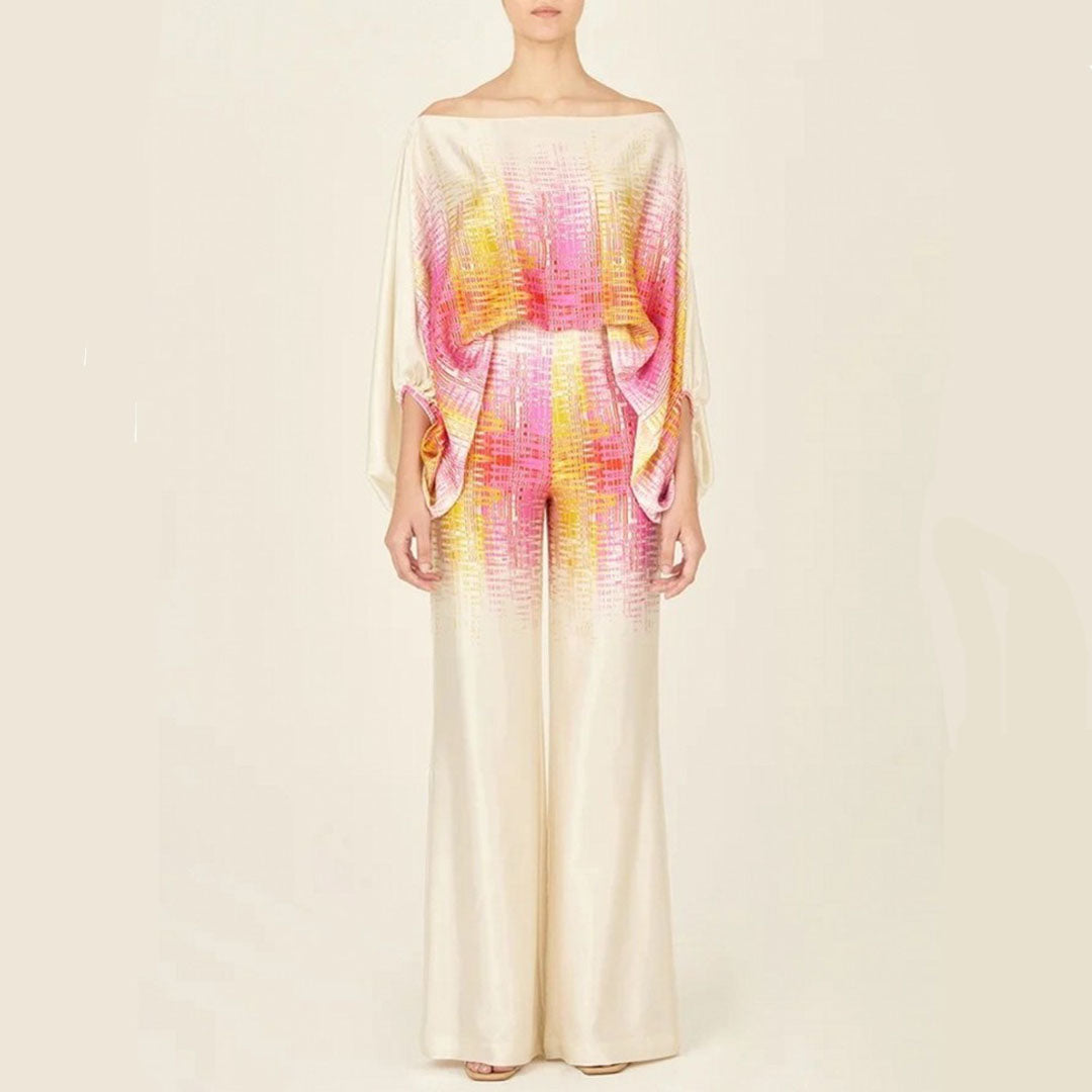 Playful print set for women's summer wardrobe, including wide leg pants and a stylish lantern sleeve top.