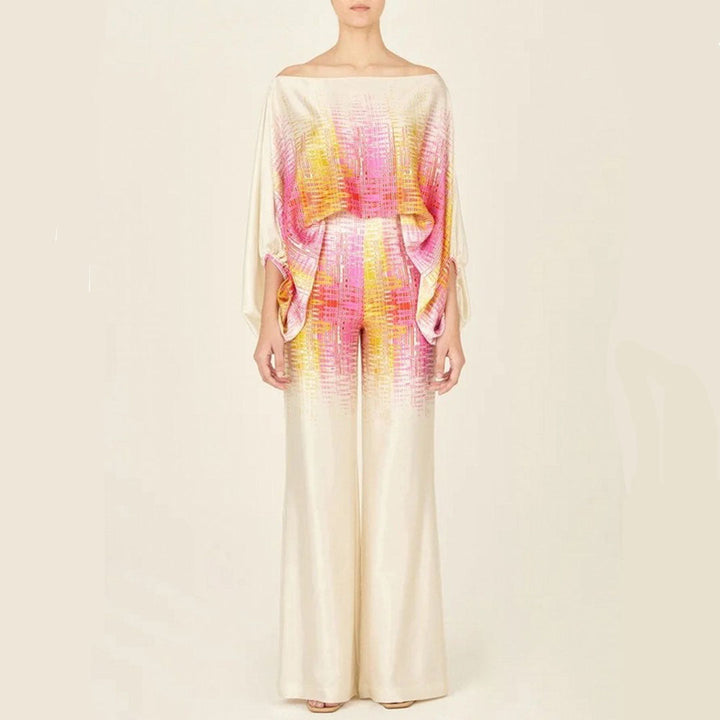 Playful print set for women's summer wardrobe, including wide leg pants and a stylish lantern sleeve top.