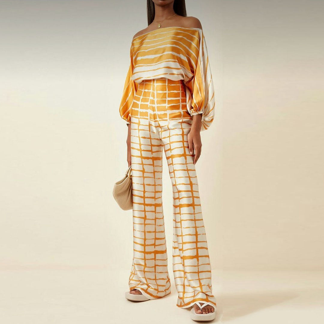 Two-piece summer set for women: Elegant design with vibrant playful prints and flattering wide leg silhouette.