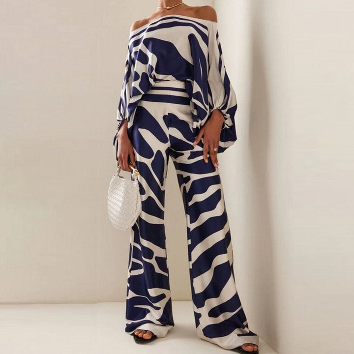 Women's fashionable ensemble: A delightful summer two-piece set with playful prints and wide leg pants.