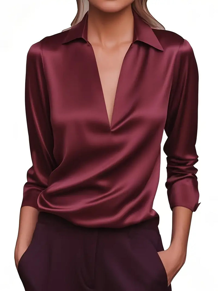 Elegant V-neck women's top, comfortable & versatile for everyday fashion or professional settings.