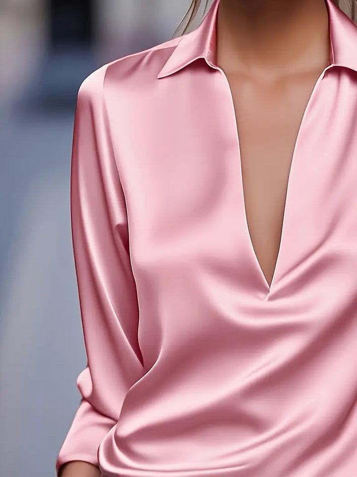 Sophisticated women's V-neck top, ideal for effortless elegant style in any setting.
