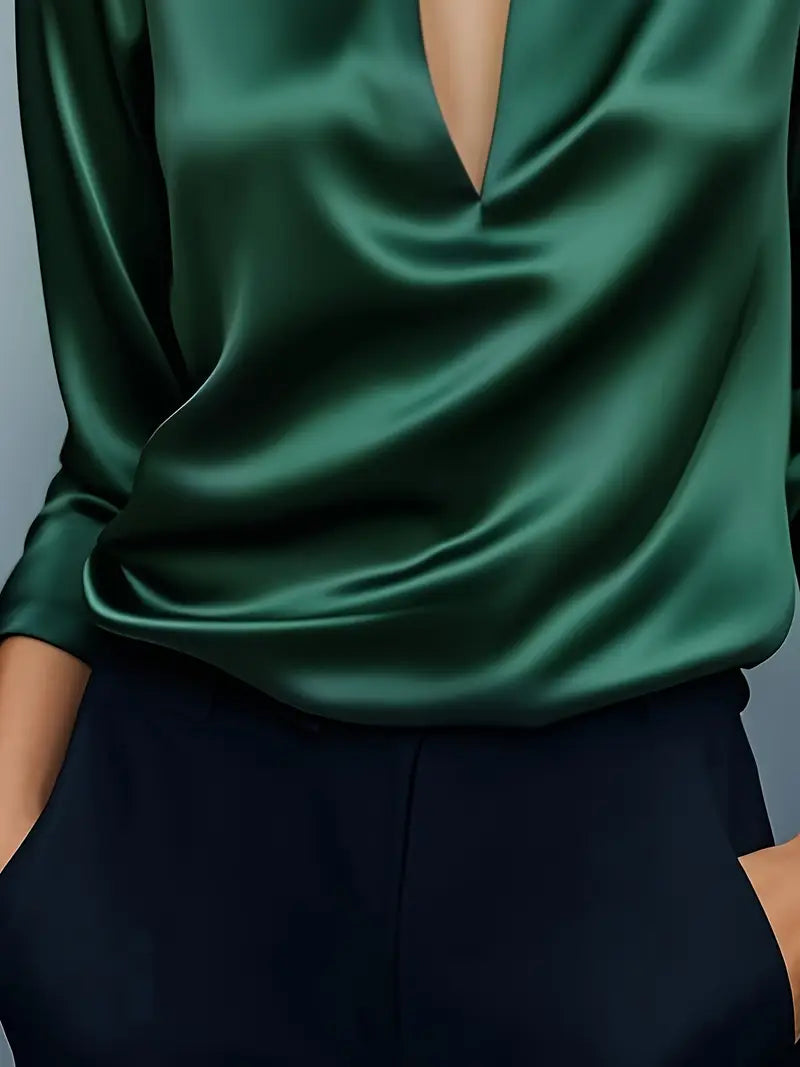 Sophisticated women's V-neck blouse, an effortless elegant top for office or casual fashion.