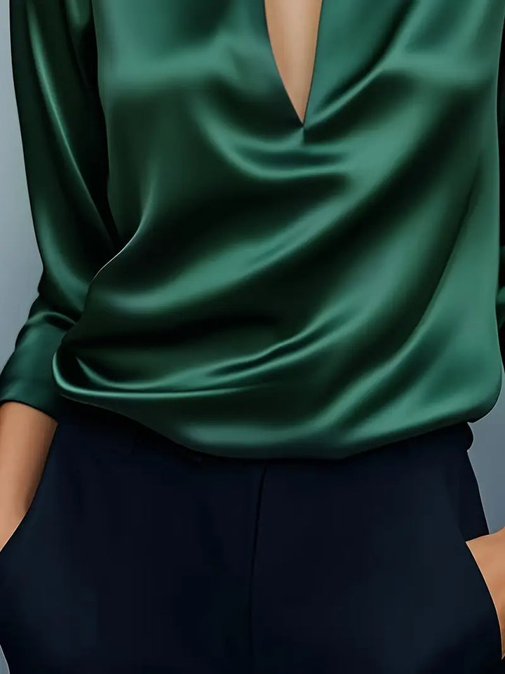 Sophisticated women's V-neck blouse, an effortless elegant top for office or casual fashion.