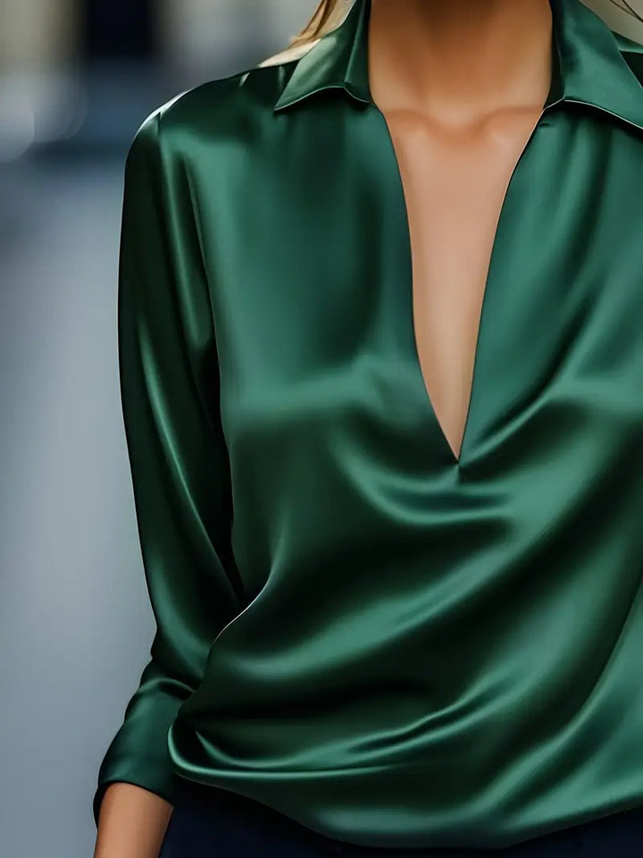 Elegant V-neck blouse for women, designed for effortless style and sophisticated comfort.