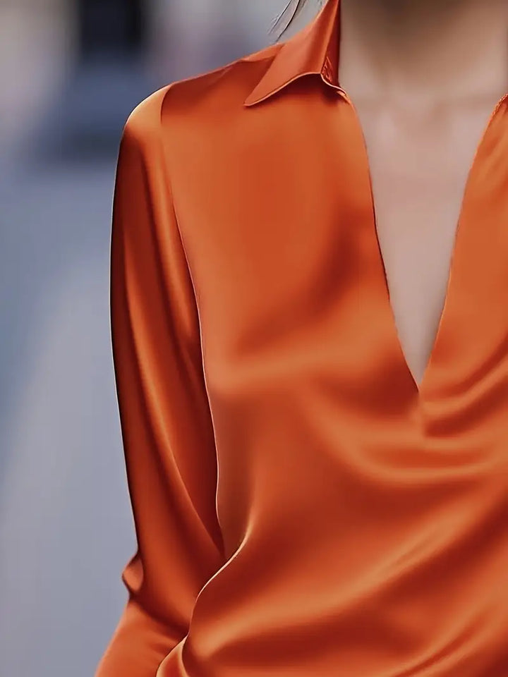 Sophisticated women's V-neck blouse, an essential for effortless style & elegant fashion.