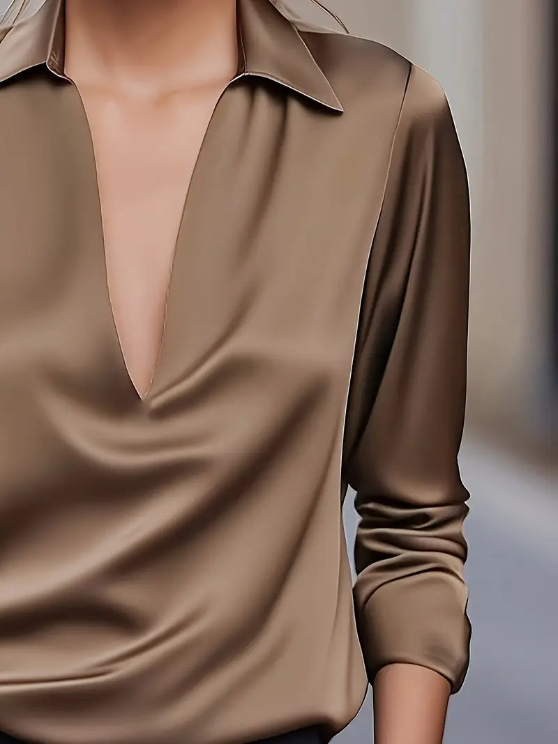 Women's comfortable V-neck top, delivering versatile elegant style for modern ladies.