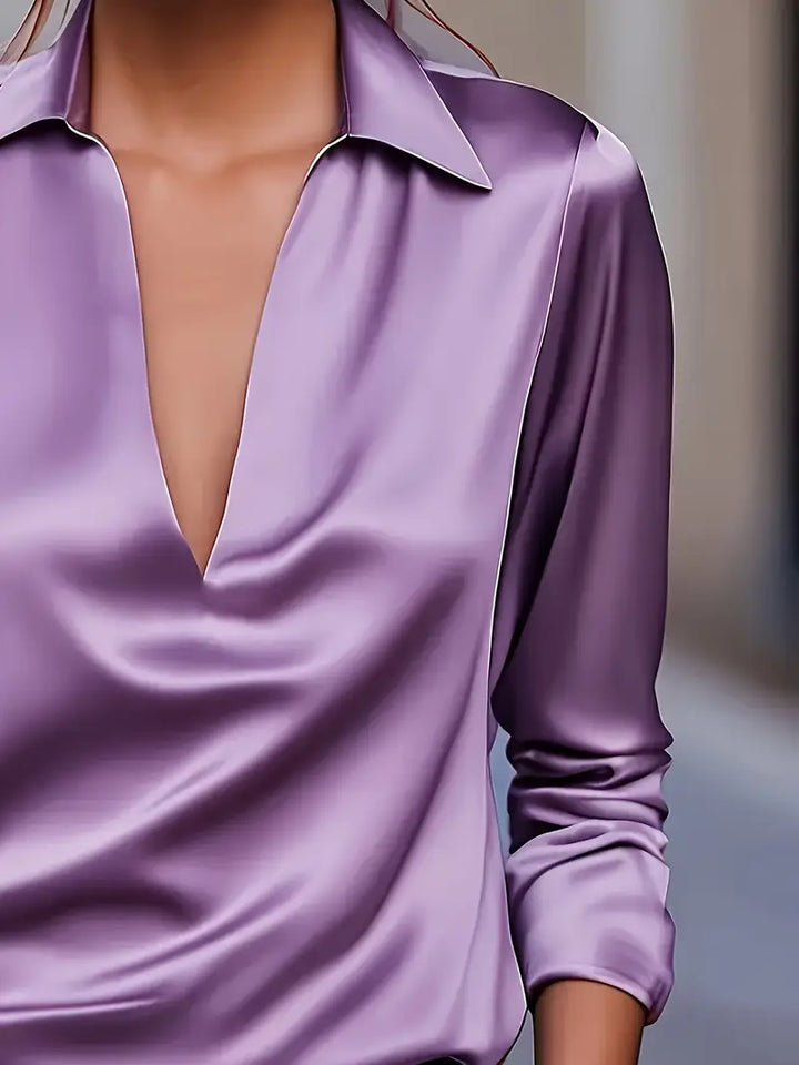 Flowy V-neck blouse for women, comfortable & stylish for effortless casual chic.