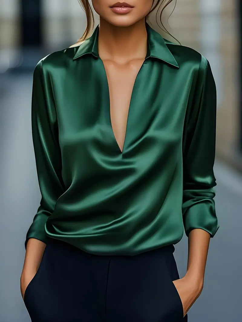 Flowy ladies' V-neck blouse, comfortable & chic for versatile everyday or office style.