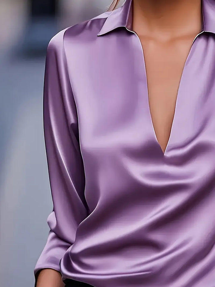 Versatile women's V-neck top, an elegant piece for office, sophisticated events, or daily wear.
